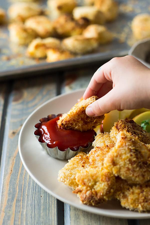 These Baked Homemade Chicken Nuggets are way better than the store bought and you can pronounce everything on these golden nuggets! | www.countrysidecravings.com