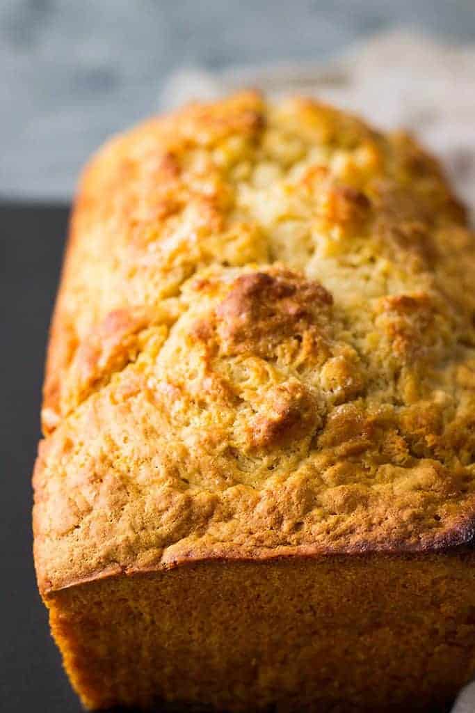 Beer Bread is a simple quick bread that is flavored with beer. It's really easy to make and goes great with any meal!