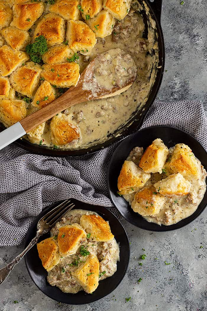 Top down view of biscuits and gravy casserole dished out ready to eat.