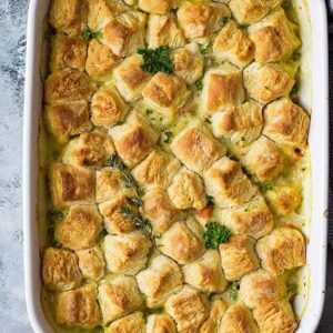 This homemade Chicken Pot Pie with Biscuits is a great way to use leftover chicken, turkey, herbs and veggies you may have hiding in the back of your fridge!