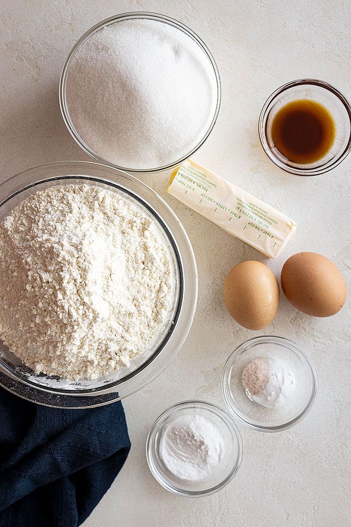 Ingredients to make coffee cake: flour, sugar, eggs, butter, vanilla.