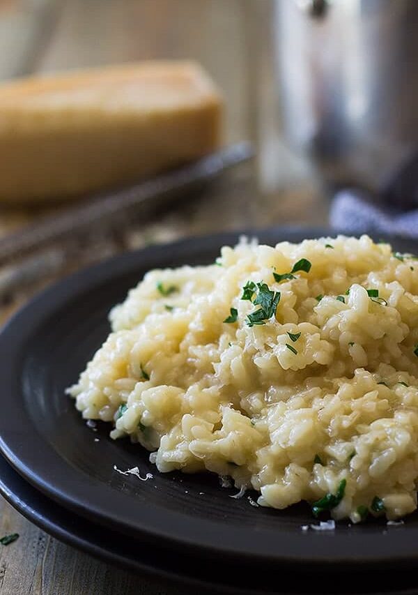 This Easy Parmesan Risotto has been simplified with the help from America's Test Kitchen. Less stirring, less work but creamy, dreamy risotto!!