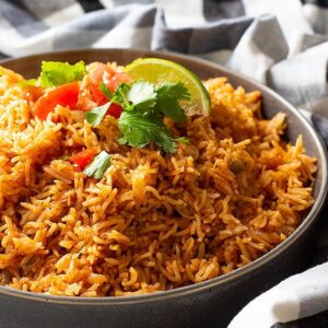 Easy Spanish Rice is the perfect side dish for all you Mexican inspired meals! Instant pot and stove top instructions included! #spanishrice #mexicanrice