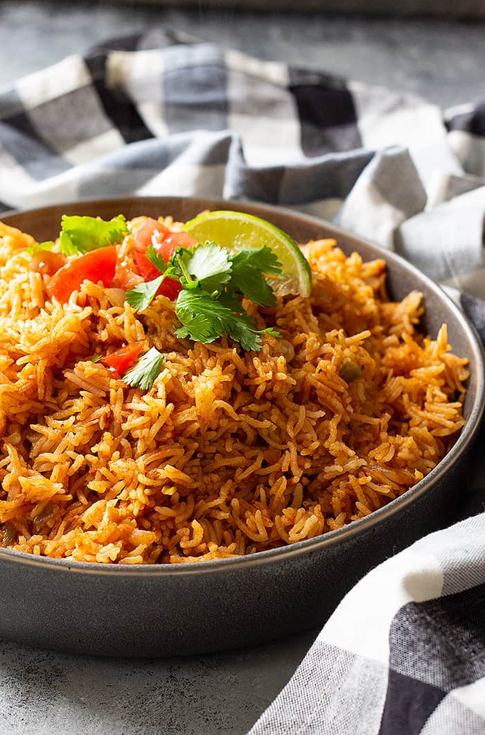 Easy Spanish Rice is the perfect side dish for all you Mexican inspired meals! Instant pot and stove top instructions included! #spanishrice #mexicanrice