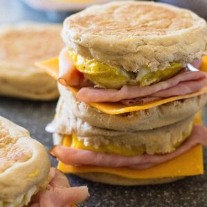 This Freezer Breakfast Ham Egg and Cheese sandwich is a healthier alternative to that Egg McMuffin! They are easy to make and are a great for breakfast on the go! | www.countrysidecravings.com