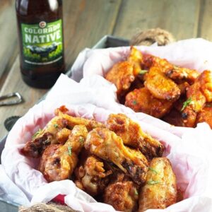 Baked Garlic Sriracha Wings- these wings are baked to crispy perfection then either coated in a garlic sriracha dry rub or sauce! | countrysidecravings.com
