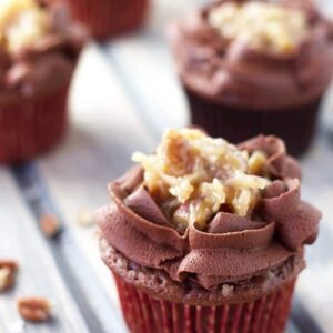 German Chocolate Cupcakes- A german chocolate cupcake topped with a caramel pecan and a sweet chocolate frosting! | Countryside Cravings