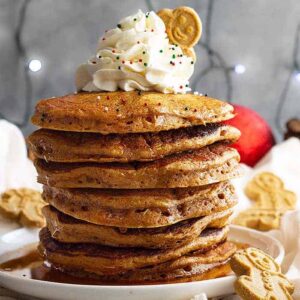 These soft and fluffy Gingerbread Pancakes are spiced just right and taste like a gingerbread cookie!! These will make the perfect Christmas morning breakfast!! #gingerbreadpanckes #christmasmorningbreakfast
