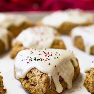 These Gingerbread Scones with cream cheese frosting are like a gingerbread cookie only in breakfast form!! Filled with cinnamon, ginger, clove, and molasses make these a wonderful breakfast treat!!