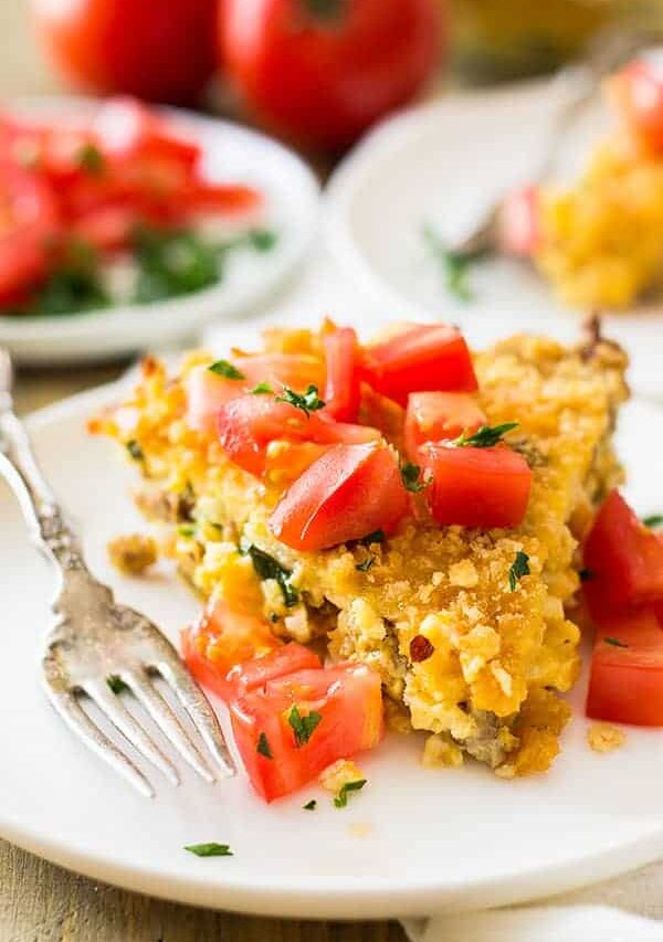This Hashbrown Sausage Breakfast Pie is filled to the top with breakfast sausage, hashbrowns, 2 cheeses, garlic and a special topping! | www.countrysidecravings.com