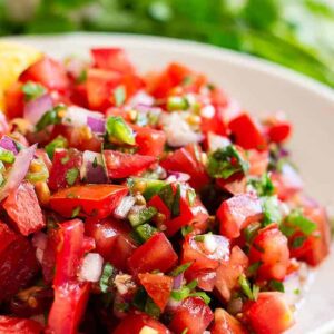 Close up view of Homemade Pico de Gallo in a bowl.