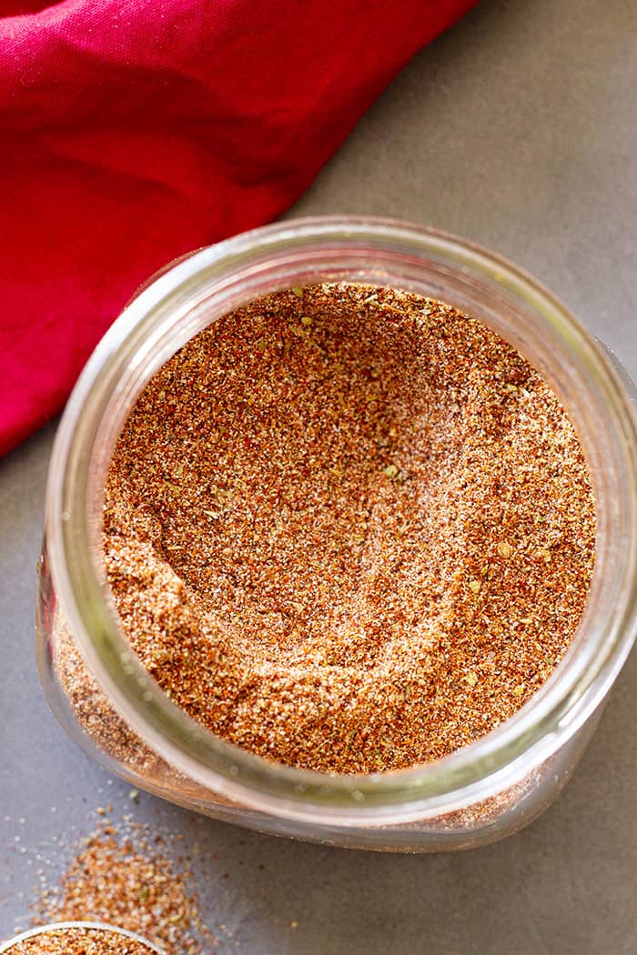 A jar full of Homemade Taco Seasoning. 