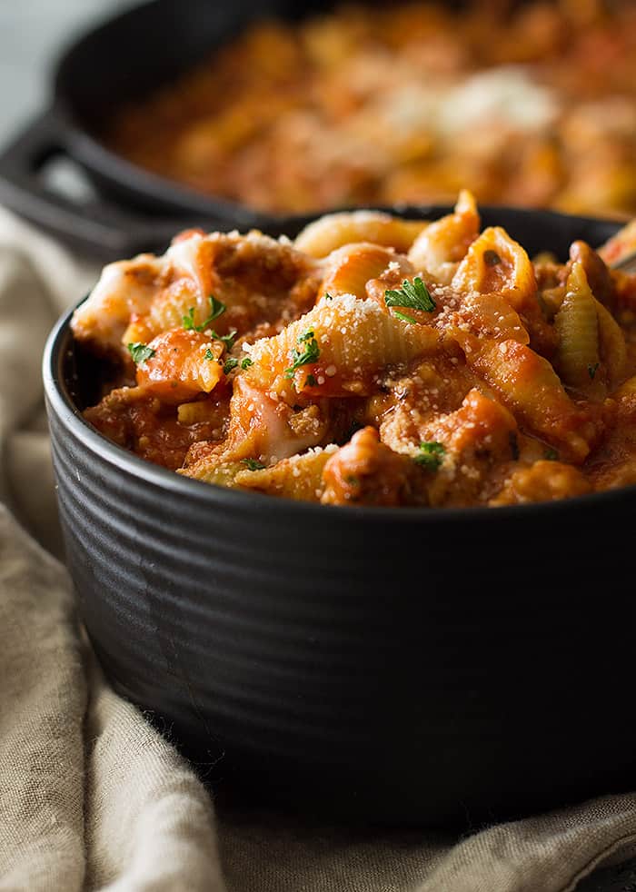 sausage pasta in black bowl