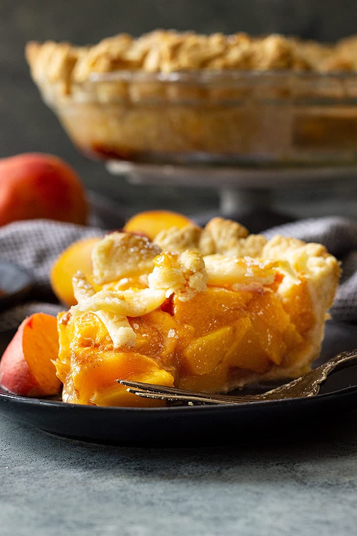Slice of peach pie.