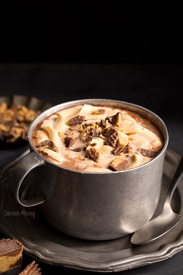 Put down the hot cocoa mix and warm up with Peanut Butter Hot Chocolate from scratch topped with homemade peanut butter whipped cream and chopped peanut butter cups.