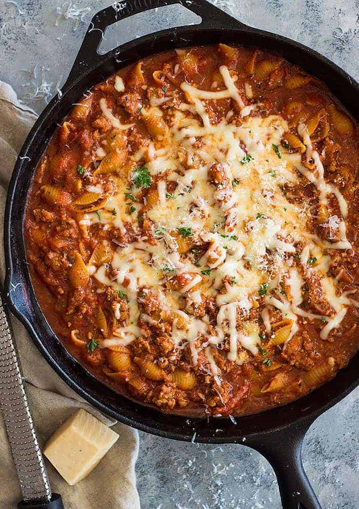 top shot of one pot Italian sausage pasta in black skillet