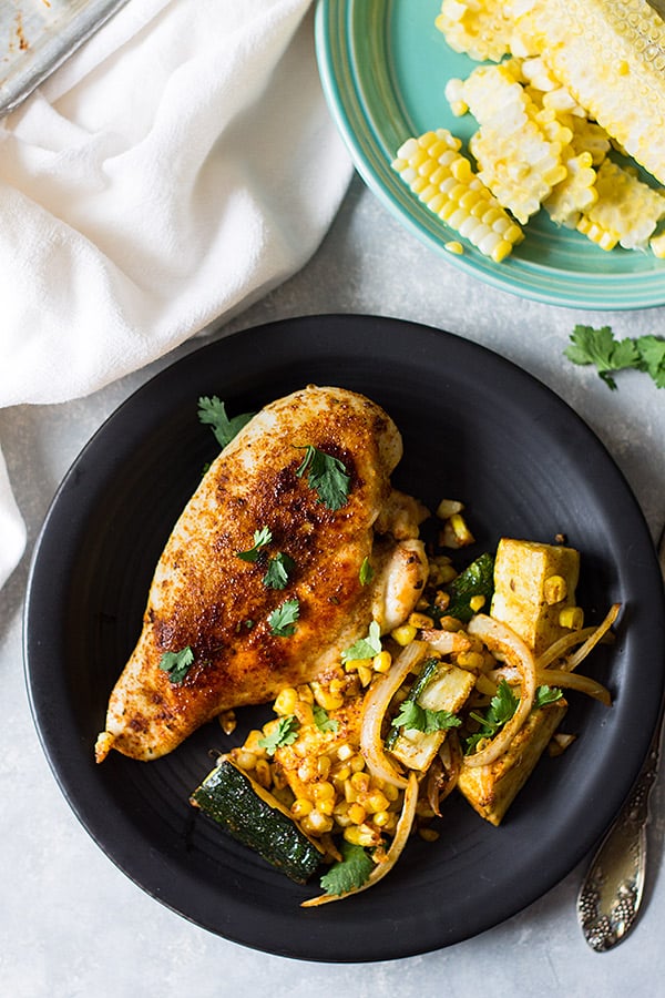 Easy Sheet Pan Mexican Chicken and Vegetables made with fresh corn, zucchini, onion, seasoned to perfection and done in 30 minutes! | www.countrysidecravings.com