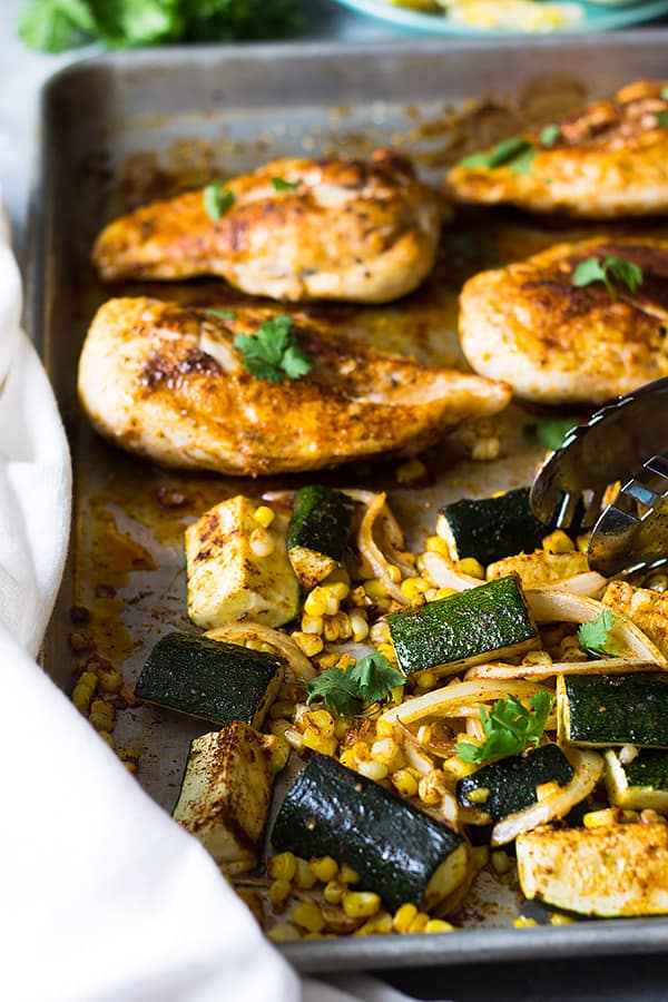 Easy Sheet Pan Mexican Chicken and Vegetables made with fresh corn, zucchini, onion, seasoned to perfection and done in 30 minutes! | www.countrysidecravings.com