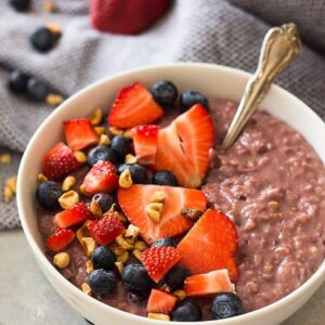 Slow Cooker Berry Oatmeal is a wonderfully hearty breakfast using steel cut oats, frozen mixed berries and your trusty crockpot! | www.countrysidecravings.com