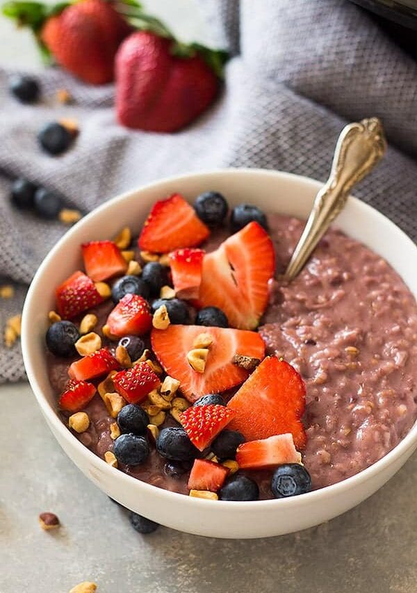 Slow Cooker Berry Oatmeal is a wonderfully hearty breakfast using steel cut oats, frozen mixed berries and your trusty crockpot! | www.countrysidecravings.com