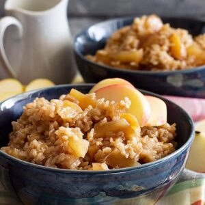 Large bowl of Slow Cooker Cinnamon Apple Breakfast Rice.