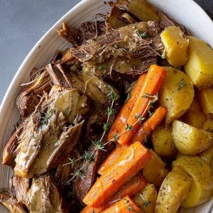 Overhead view of slow cooker pot roast.