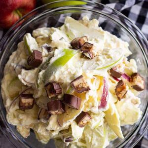 This Snicker Apple Salad is a super easy dessert salad that's great to take to potlucks, picnics, and family gatherings! It's guaranteed to be the first to go! #apple #easyrecipe #dessert #coolwhip