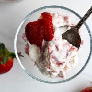 Overhead view of strawberry rhubarb fool in a glass serving bowl.