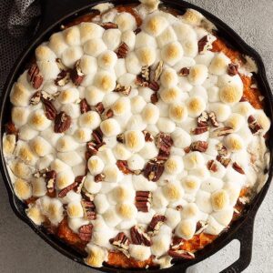 Overhead view of casserole fresh from the oven. Marshmallows are puffy and golden.