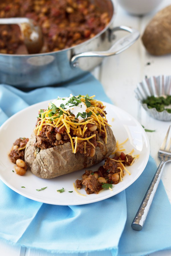 Taco Baked Potatoes are a great way to use up leftover baked potatoes and make for a super satisfying dinner! | www.countrysidecravings.com