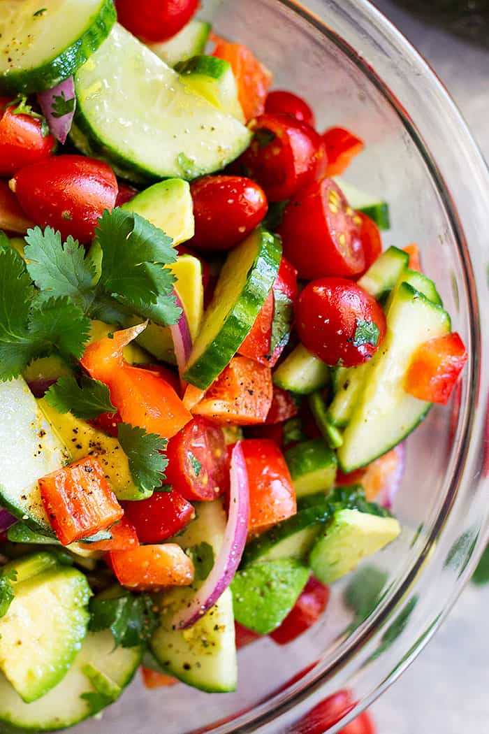 Tomato Cucumber and Avocado Salad -is a light, fresh, and flavorful salad. It's quick and easy to make and super healthy to eat!